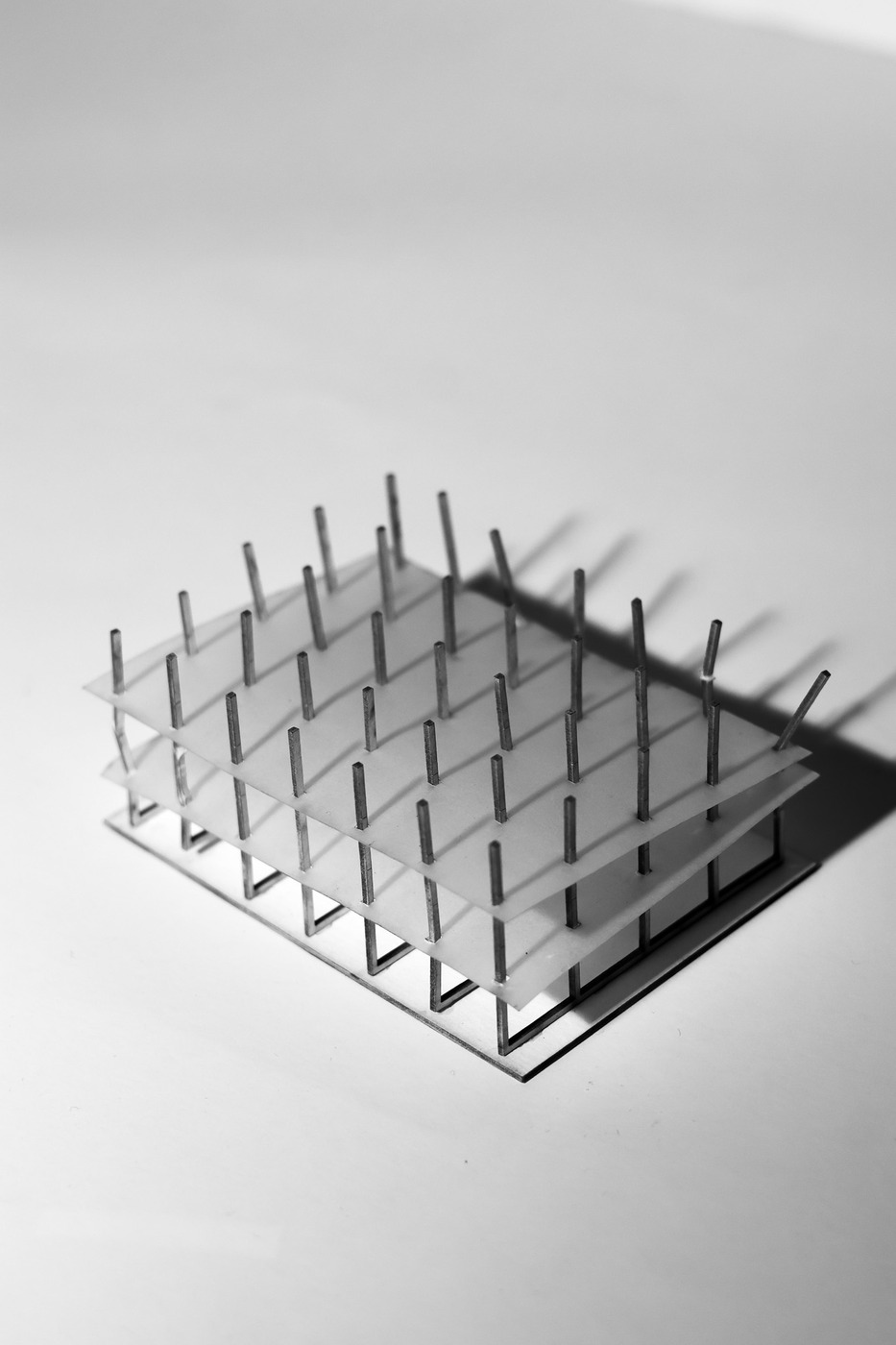 Study model, stacked acrylic plates on a pin grid.